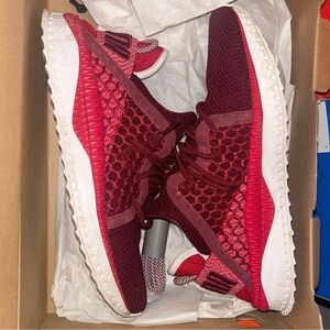 Red/maroon puma sneakers